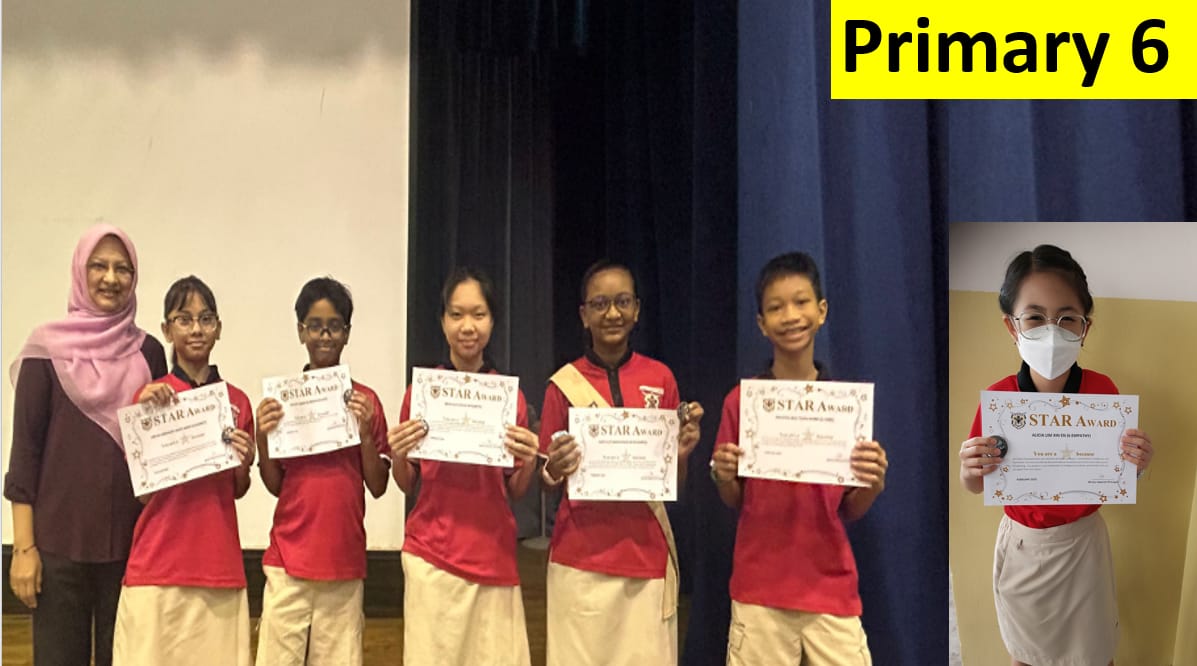 Six Primary 6 students in red uniforms hold Star Award certificates, posed with a teacher in a pink hijab.